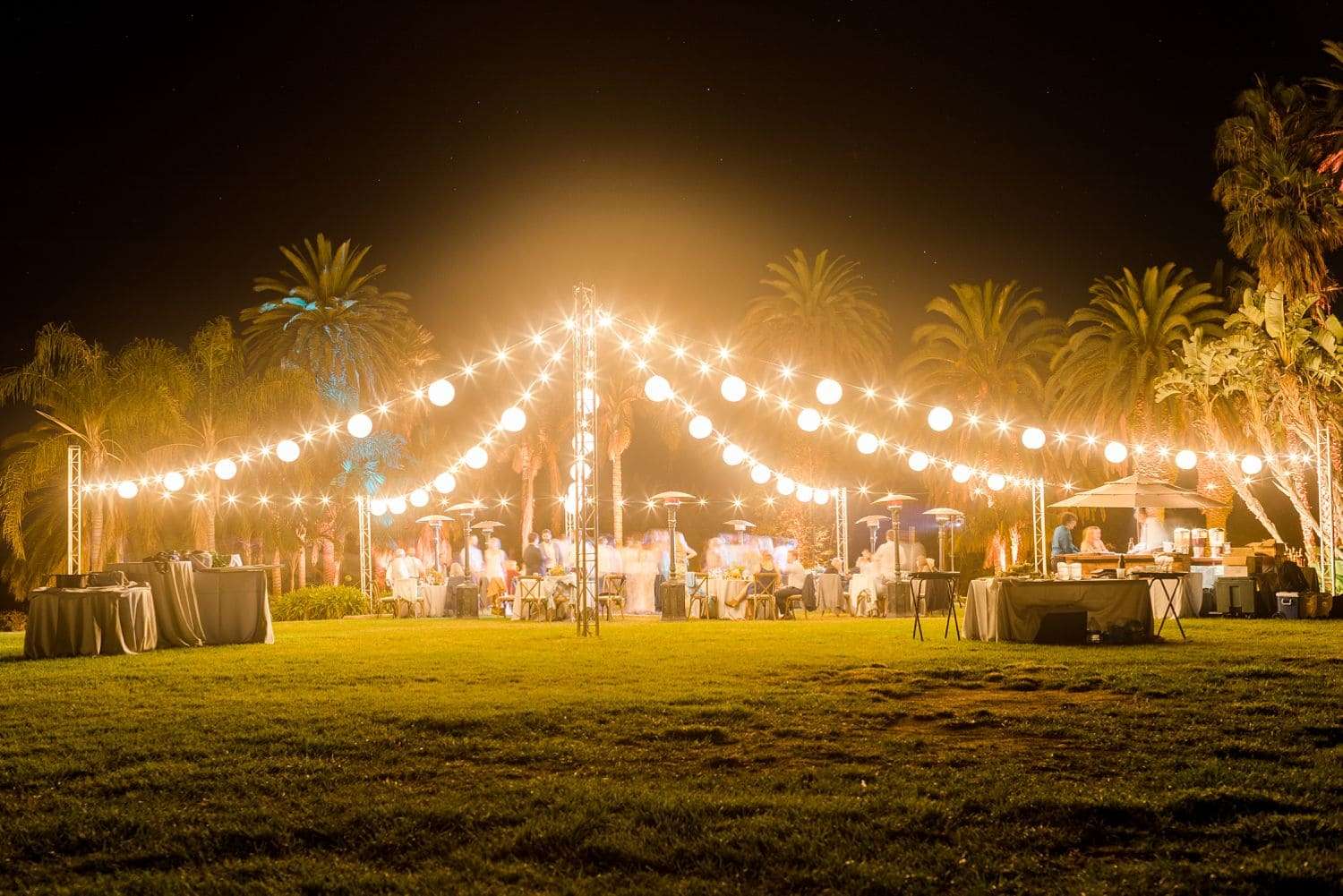 outdoor wedding reception with twinkle lights